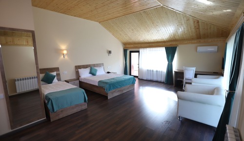 Deluxe Triple Room