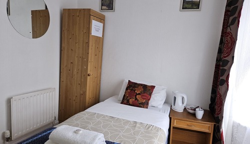 Basic Single Room, Shared Bathroom, City View