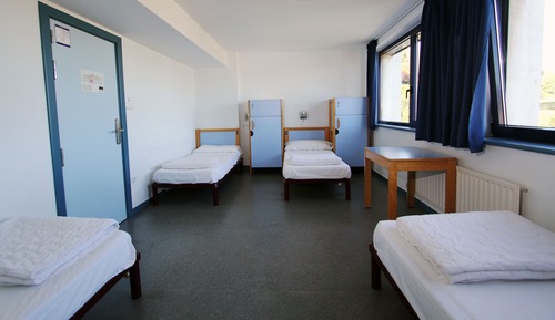 Quadruple room with shared bathroom