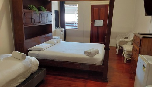 Standard Room, 1 King Bed, 1 Single Bed, Shared Bathroom