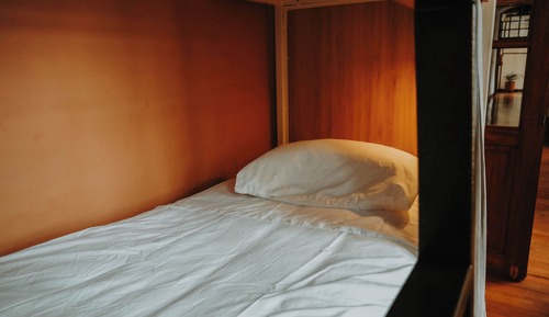 Cama en dormitorio mixto 10 camas