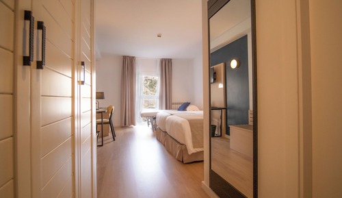 Triple Room (2 Adults + 1 Child)