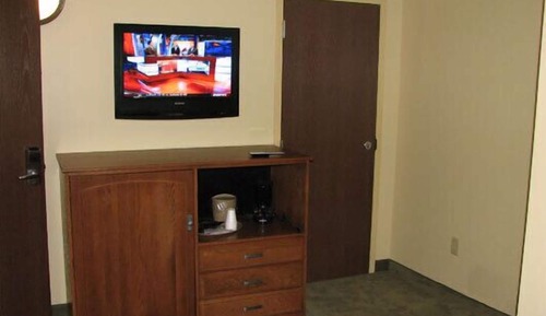 Suite, 1 King Bed with Sofa bed, Refrigerator & Microwave