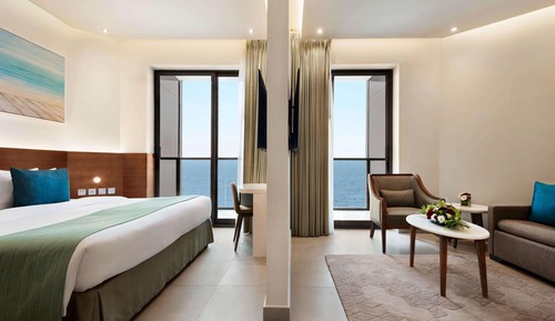 Suite, 1 King Bed, Smoking, Sea View