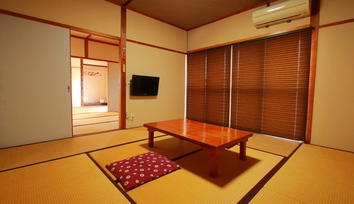 Japanese-Style Family Room with Shared Bathroom