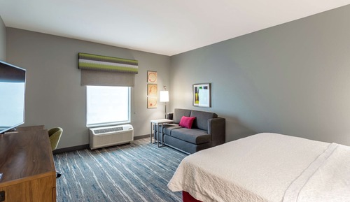 Room, 1 King Bed with Sofa bed, Refrigerator & Microwave