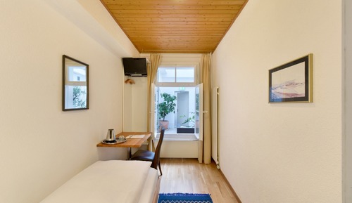 Economy Single Room (External Private Bathroom)