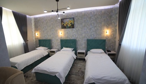 Economy Triple Room, City View