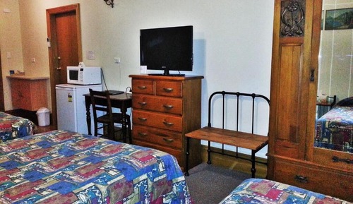Deluxe Quadruple Room, Multiple Beds, Patio, Courtyard View