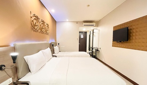 Deluxe Triple Room