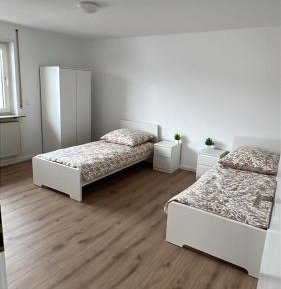 Three-Bedroom Apartment with Balcony