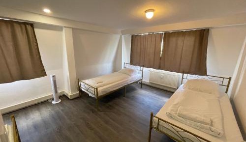 Economy Triple Room with Shared Bathroom