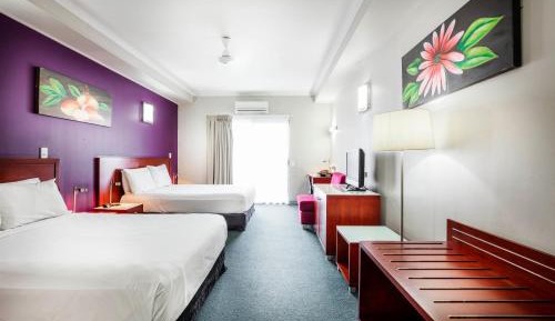 Room with Twin and Queen Beds and Pool View