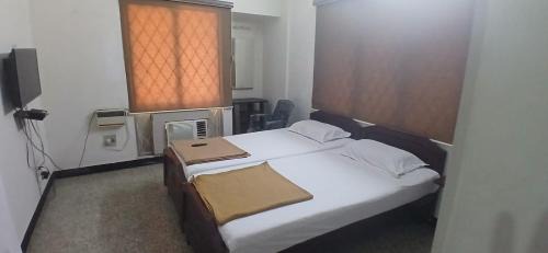 Deluxe Double Room (2 Adults + 1 Child)