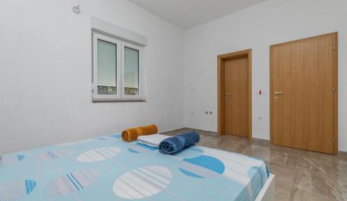 One-Bedroom Apartment with Balcony and Sea View