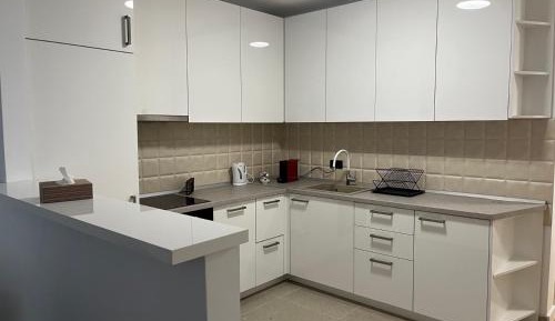 Three-Bedroom Apartment with Balcony