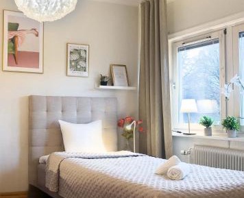 Deluxe One-Bedroom Apartment with Garden View