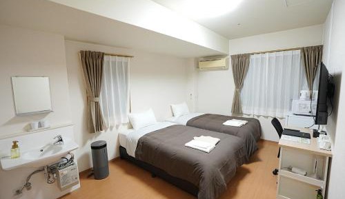 Twin Room with Private Toilet - Shared Bathroom