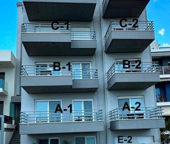One-Bedroom Apartment with Balcony and Sea View