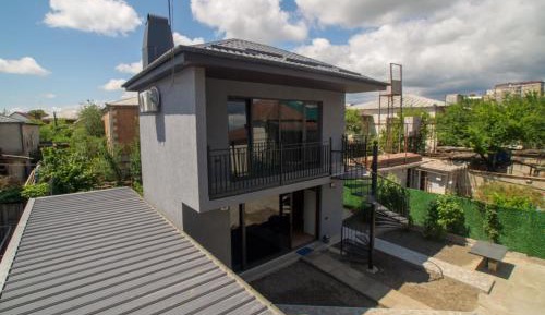 One-Bedroom Apartment with Balcony and City View