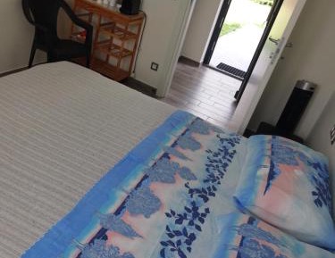 Deluxe One-Bedroom Apartment with Garden View