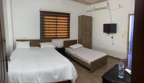 Deluxe Two-Bedroom Apartment with Garden View