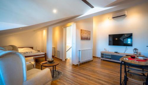 One-Bedroom Apartment with Balcony and City View
