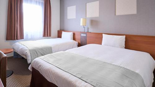 Double Bed + Extra Bed - Non-Smoking