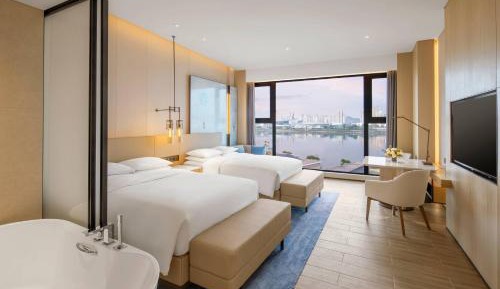 Double Room with Two Double Beds and Partial River View