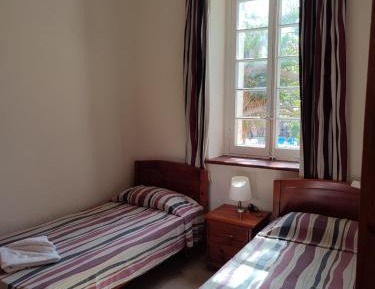 Twin Room in Shared Comfort Apartment with Common Bathroom