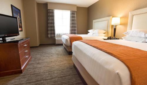 Queen Suite with Two Queen Beds and Sofa Bed