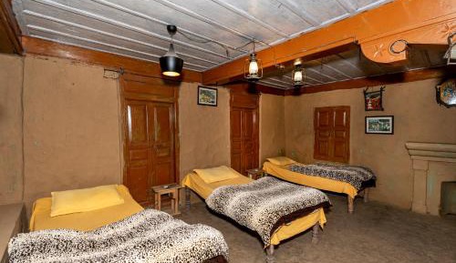 Single Bed in Dormitory Room