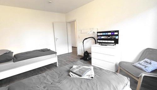 Three-Bedroom Apartment with Balcony
