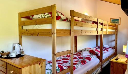 Quadruple Room with Shared Bathroom