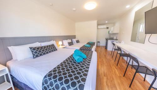Deluxe Room with Queen and Two Single Beds