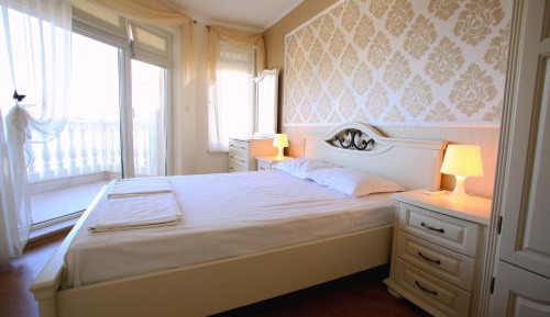 One-Bedroom Apartment with Balcony and Partial Sea View