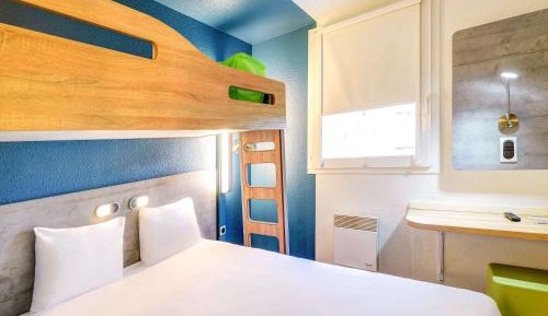 Room with One Queen Bed and One Bunk Bed