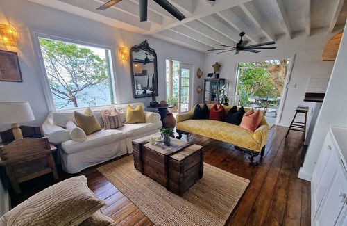 Wesley Will House | Spectacular clifftop house with hot tub next to sandy beach, stunning sea views