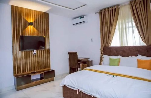 Ado Ekiti Hotel | TAJ SUITES