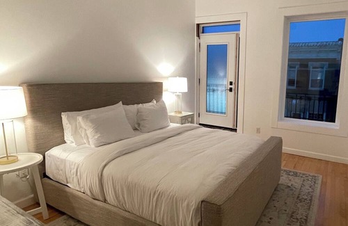 Le Roy Condo | Luxurious, two Bedroom loft provides comfort and style in a peaceful setting.