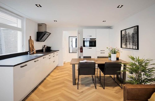 Burgwallen Nieuwe Zijde Apartment | Indulge in Luxury Exquisite 3-Bedroom Apartment