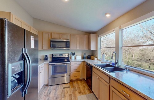 McKinney House | Hot tub, dog-friendly home with large yard, hot tub, grill, smart TV, W/D, & AC