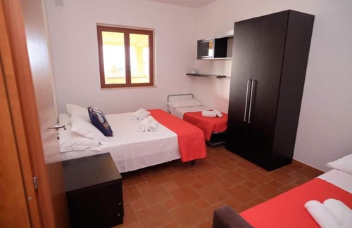 Torrenova Apartment | Apartment "Costa Tirrena 1" with Sea View & Shared Pool