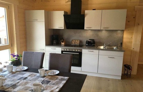 Buching House | Log cabin Green Heart
