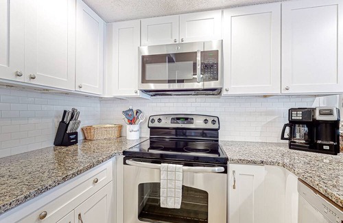 Surfcrest Village Condo | Recently updated resort condo with 2 pools, 2 balconies, ocean views, BBQ, & W/D