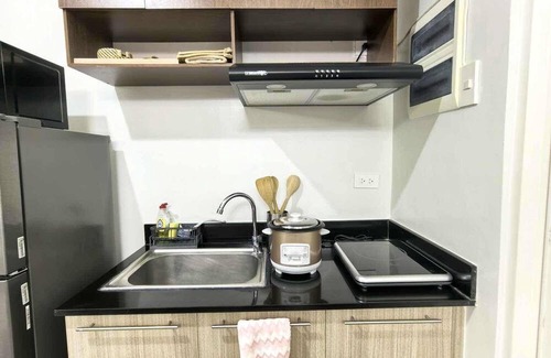 Puerto Princesa City Centre Apartment | Cozy Studio, Smart Lock, Balcony, Near Airport Puerto Princesa City, Palawan.