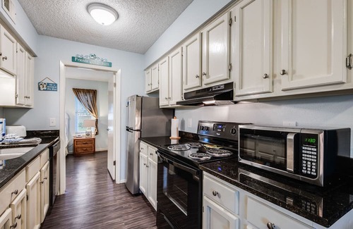 Port Aransas Condo | Roomy 1 BDRM Large Pool w/a Private Courtyard and a 5 Min Walk to the Beach