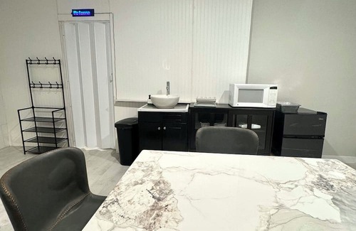 Barker House | Master Bedroom with Private Bathroom