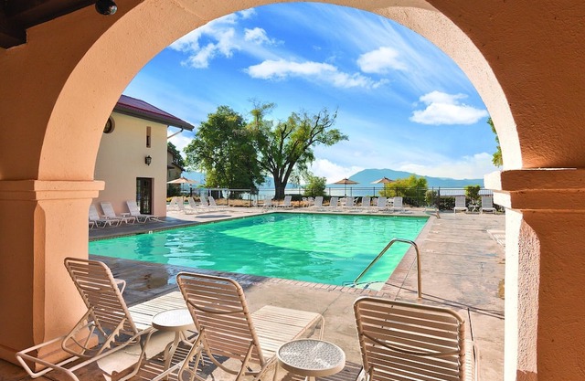 Enjoy Clear Lake with the family in this resort 2BD condo with resort boat dock