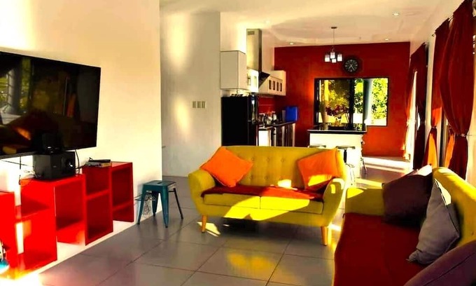 Dauin Villa | overlooking villa with breathtaking sunrises a modern kitchen big swimming pool
